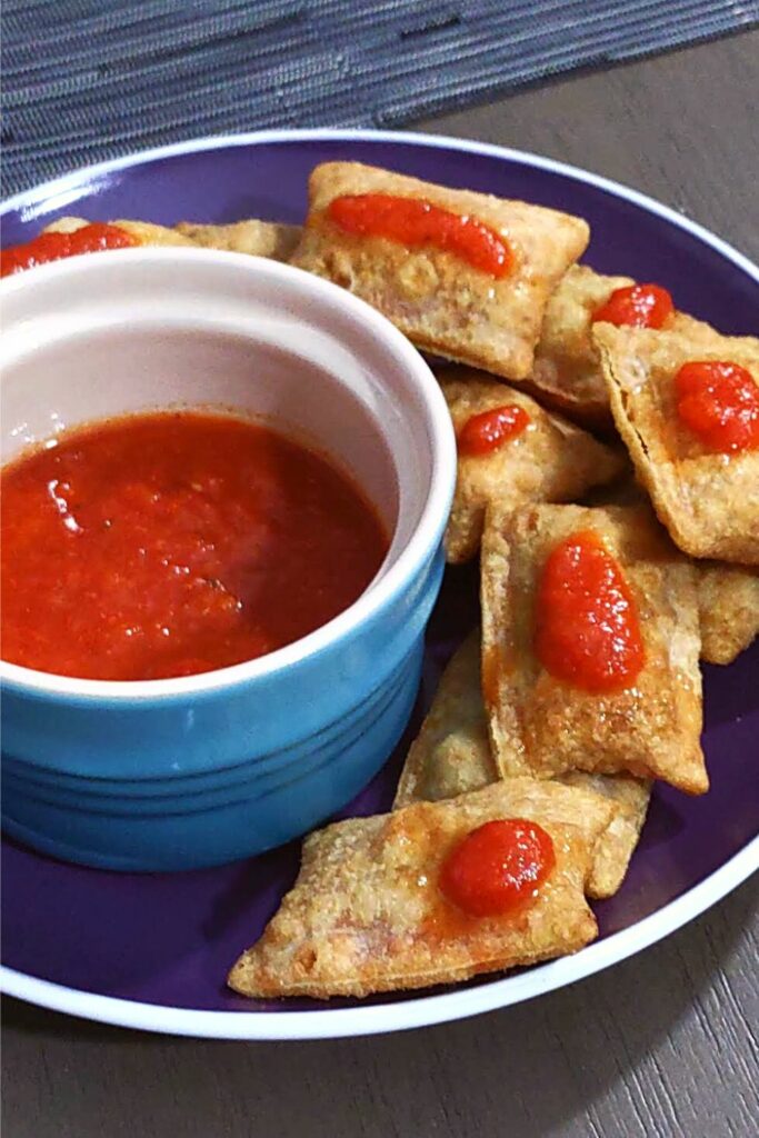 microwave pizza rolls with marinara on top