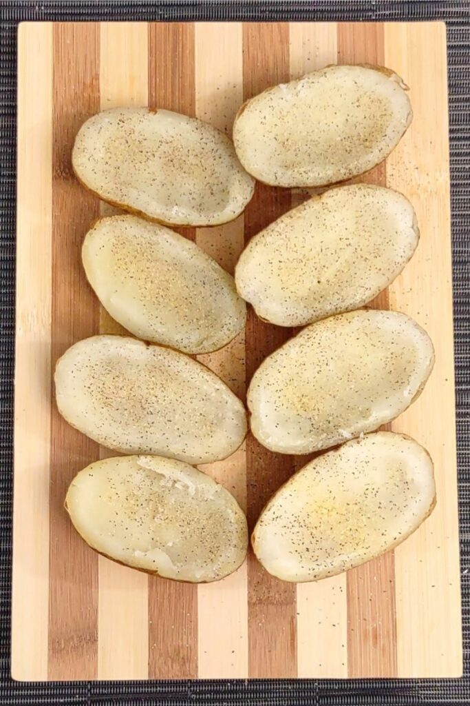 season potato skins with salt pepper and garlic powder