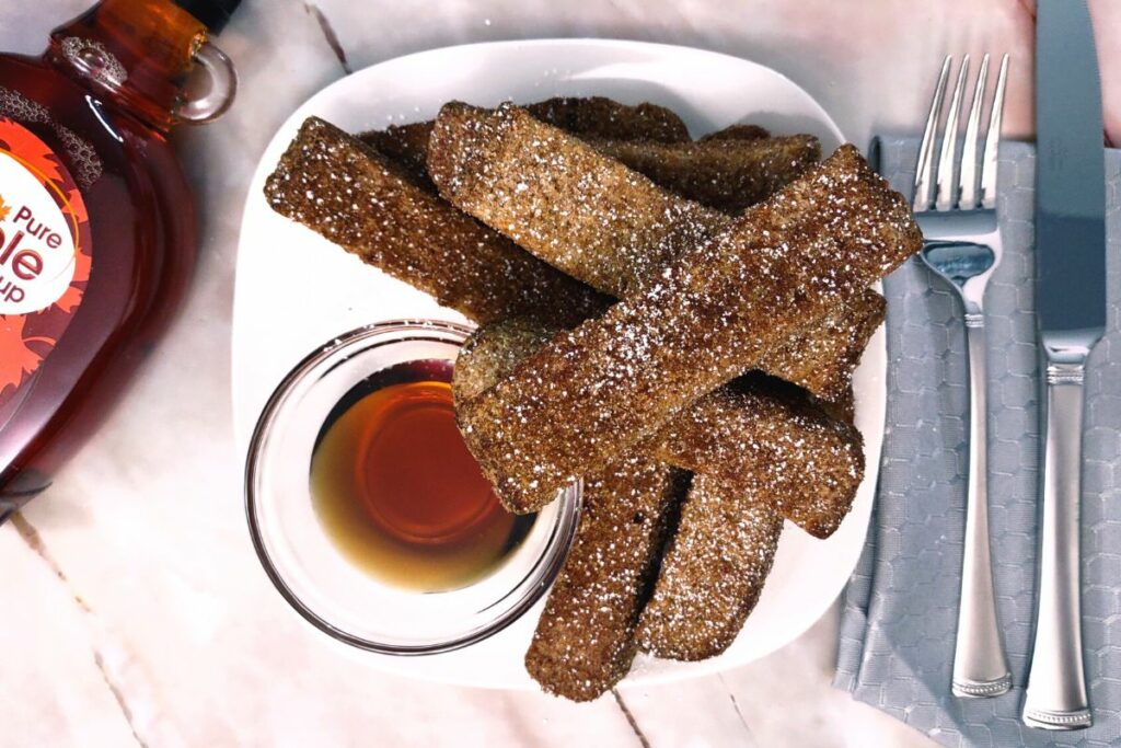 air fryer cinnamon french toast sticks with powdered sugar