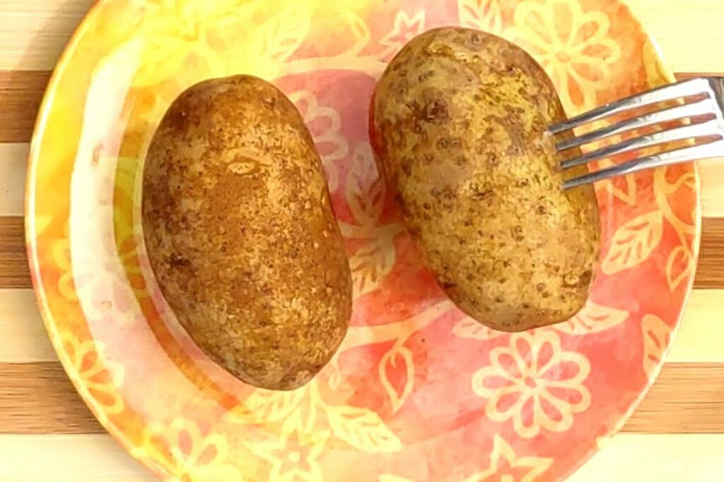 pierce skin of potato with a fork