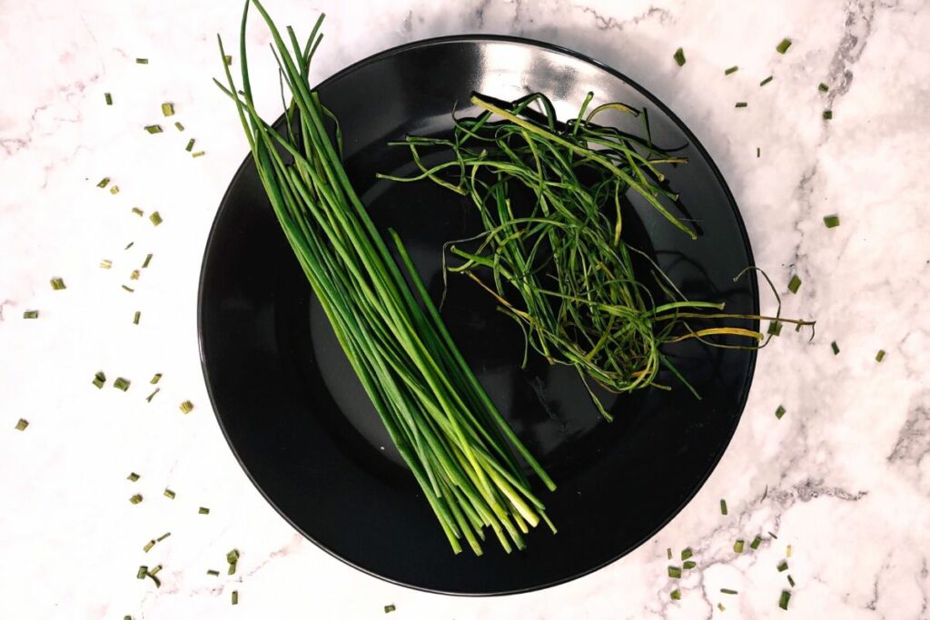air fryer dried chives and fresh chive stalks on plate