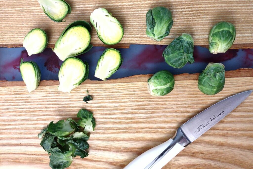 cut brussel sprouts in half and remove excess leaves