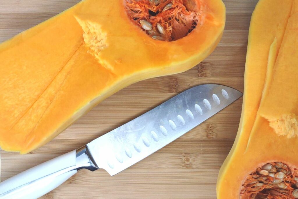 cut butternut squash lengthwise using a chef knife
