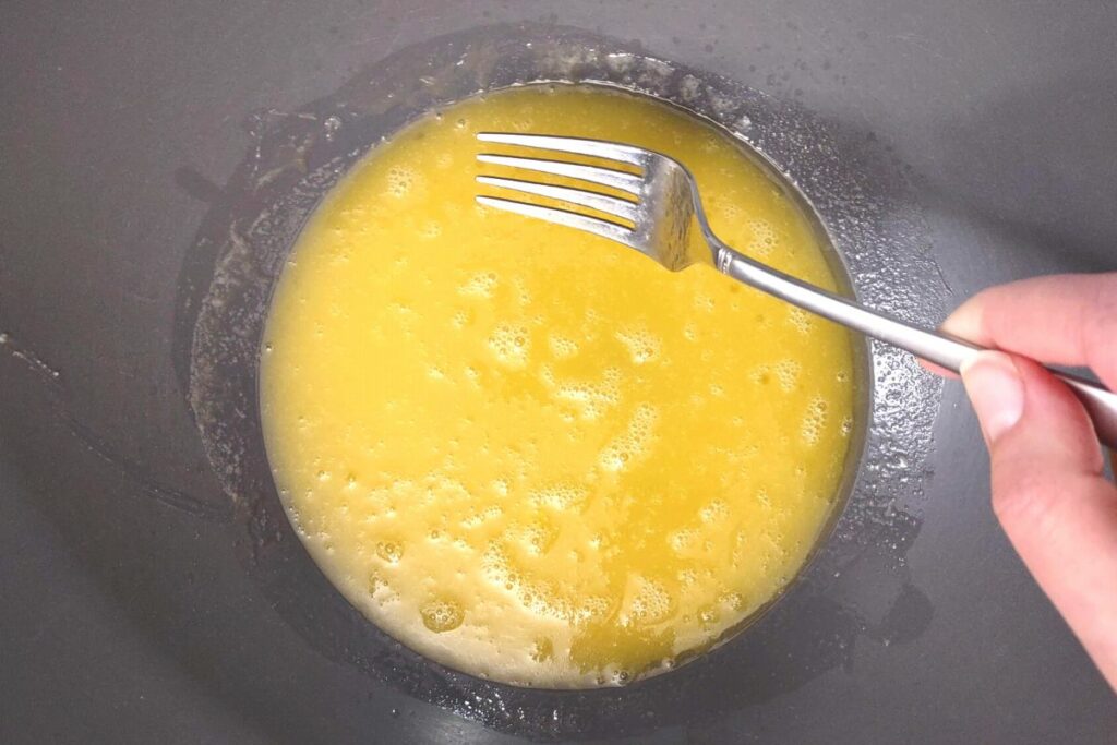 thoroughly whisk in the eggs