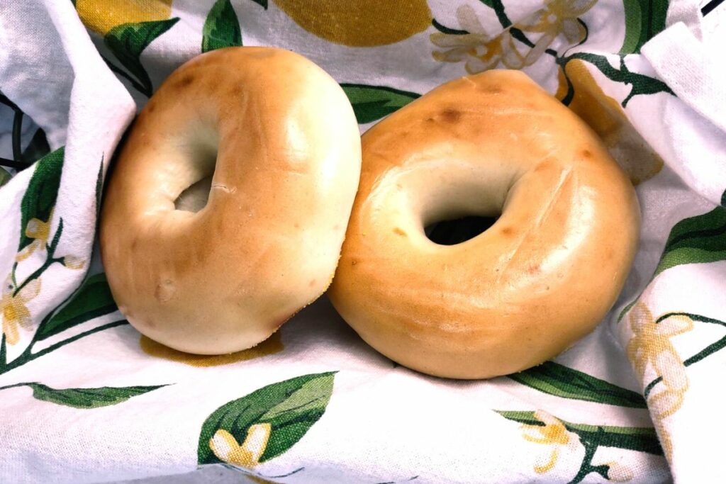 two bagels defrosted in the air fryer