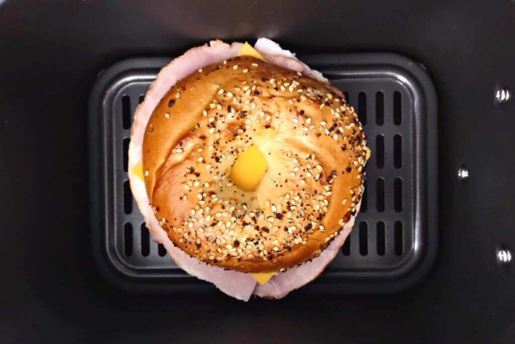 add ham and cheese bagel to air fryer basket