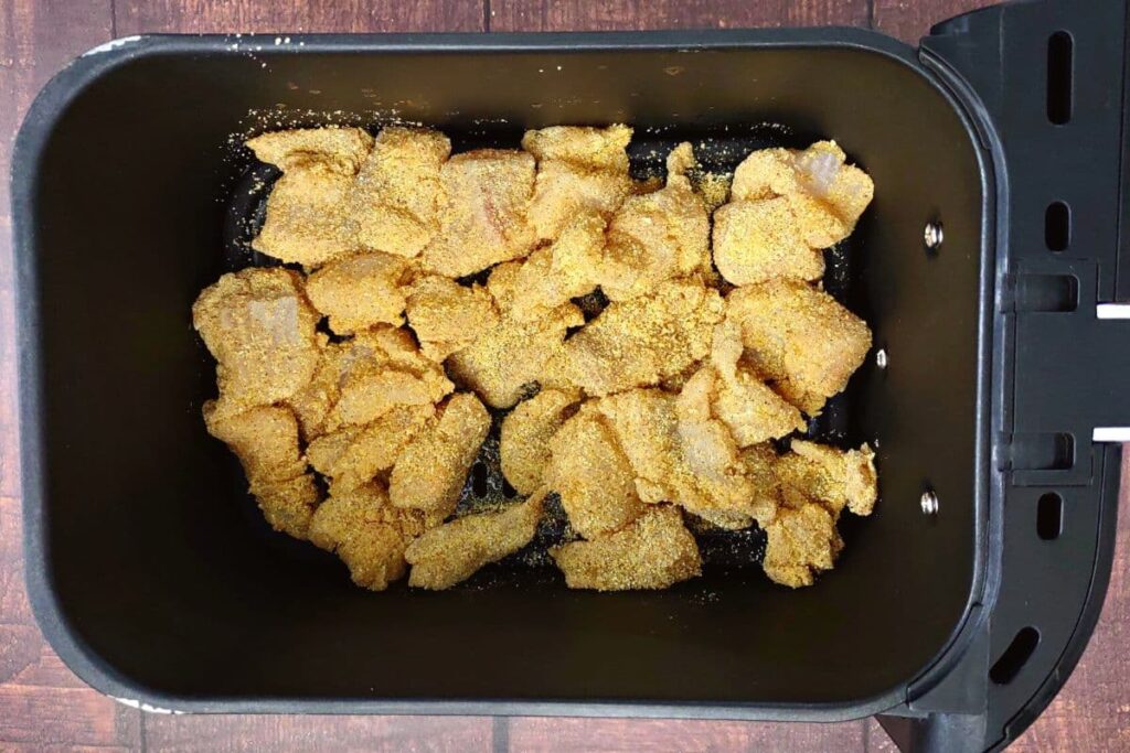 add breaded catfish to air fryer basket
