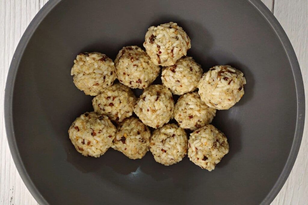 chill formed arancini rice balls in refrigerator