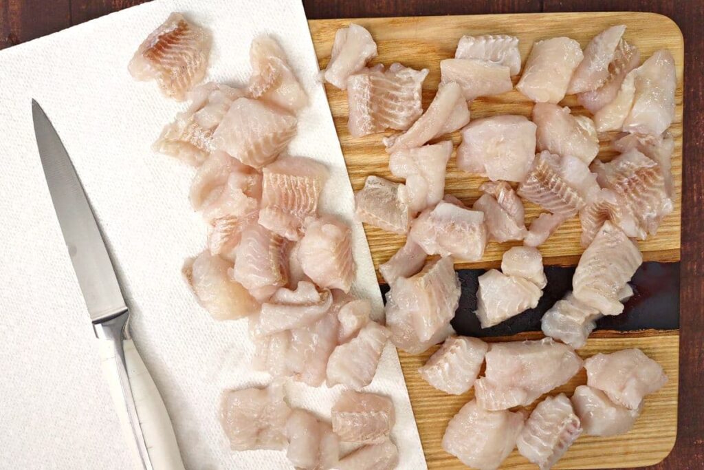 cut fresh catfish into even chunks