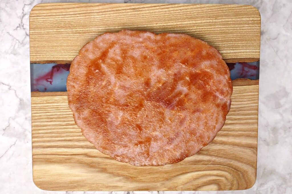 spread half your paste mixture on ham steak