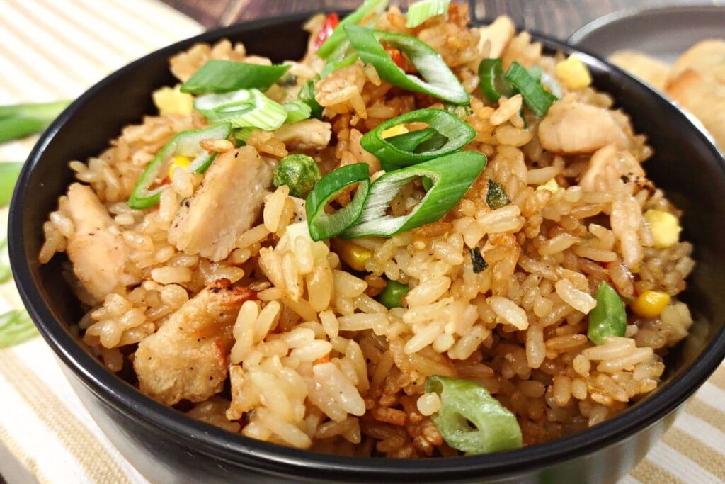 close up of air fried frozen chicken fried rice in a bowl