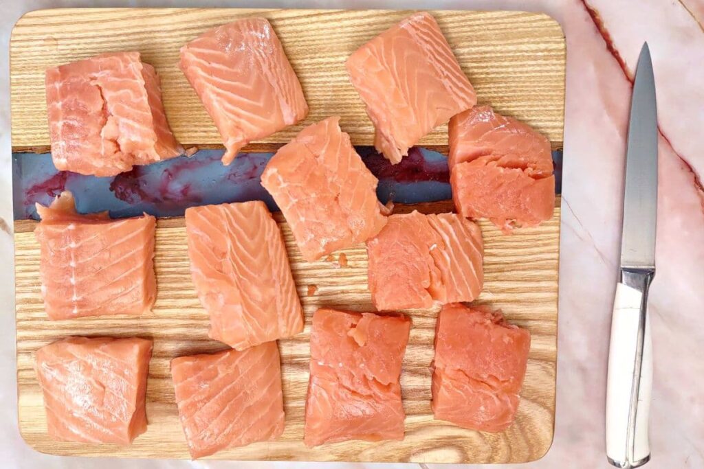 cut salmon into even portions