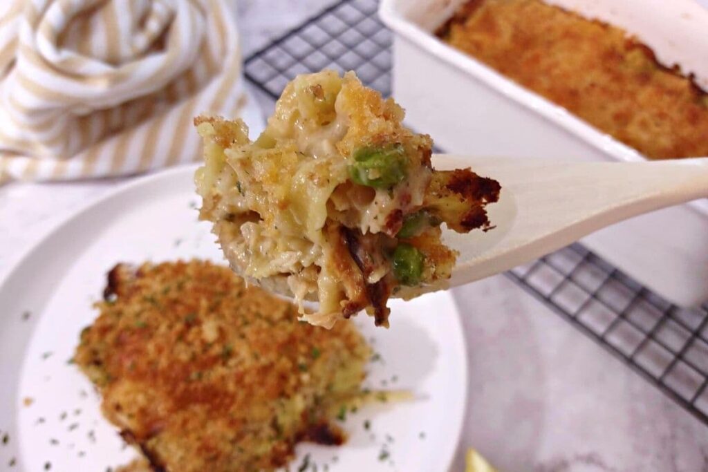 air fryer tuna noodle casserole scooped on a wooden spoon