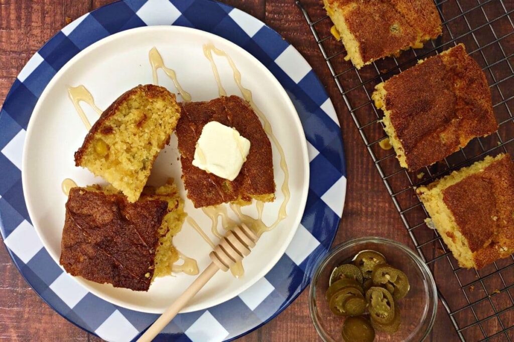 overhead view of air fryer cornbread on a plate with butter