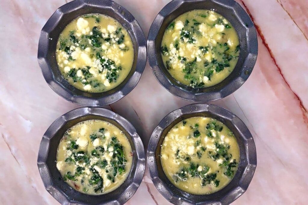 add egg mixture to mini quiche pans