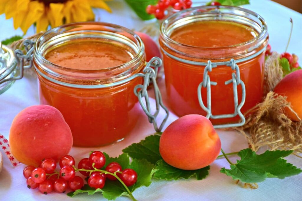 fresh peach jam in glass containers