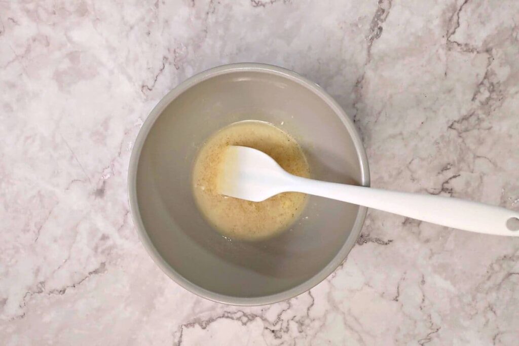 mix melted butter and honey in a small bowl