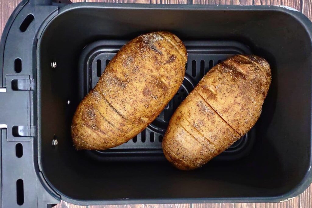 place hasselback potatoes in air fryer basket