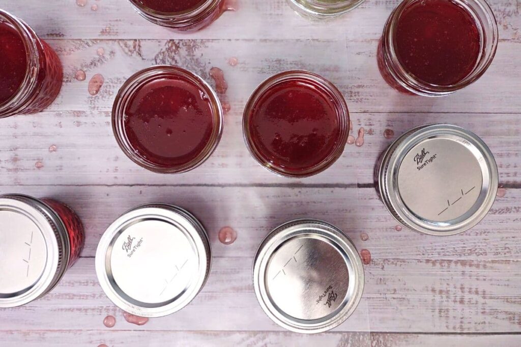 place lids on all canning jars
