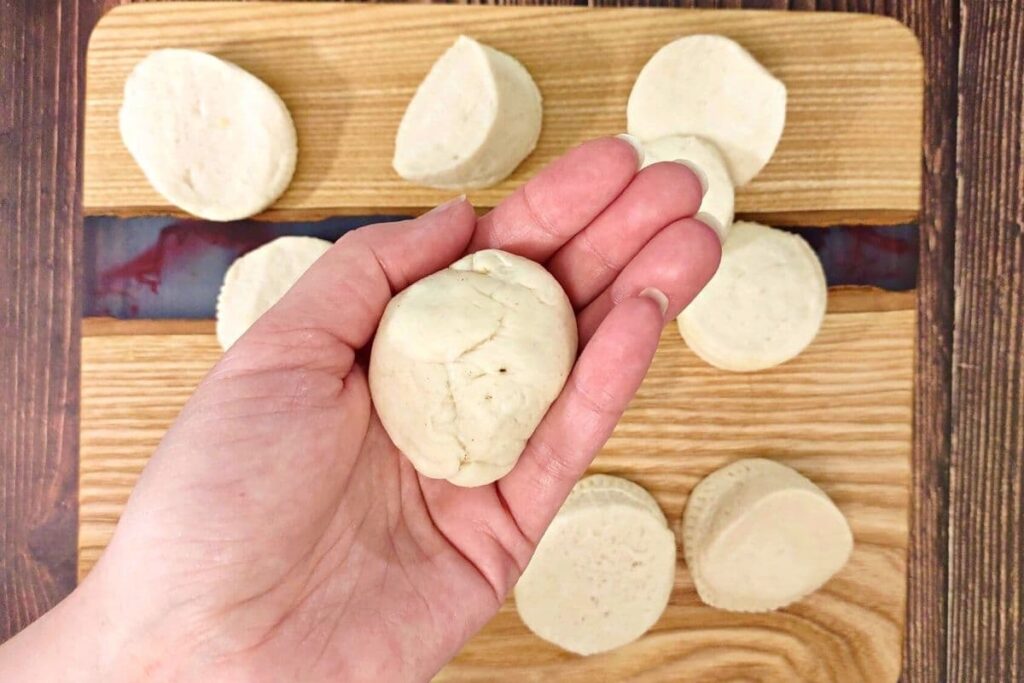 roll edges of dough over top the filling into a ball