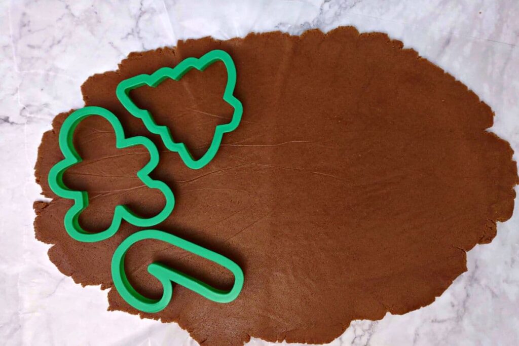 use tools to cut out your favorite shapes in gingerbread dough