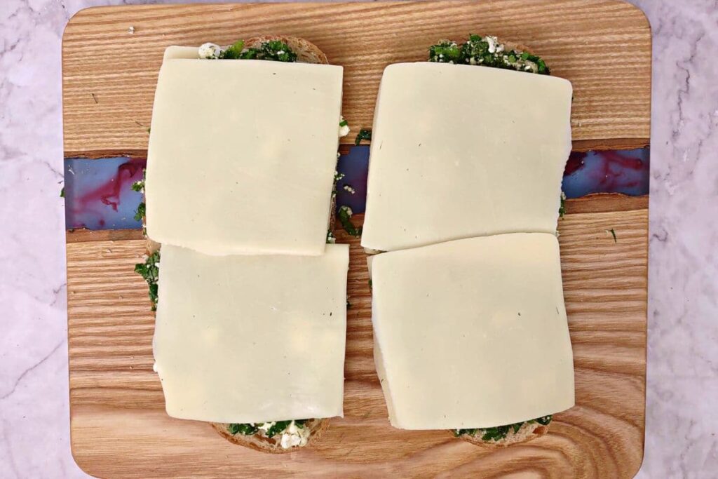 add remaining cheese slices on top of spinach mixture