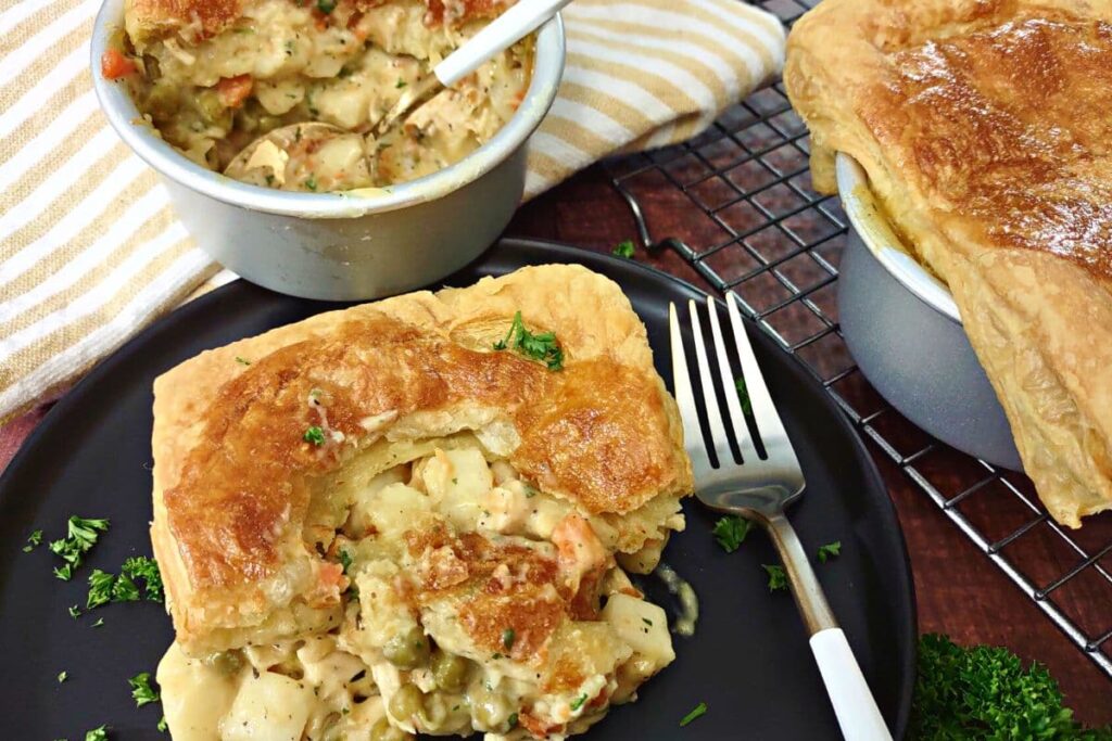 chicken pot pie cooked in the air fryer on a plate with a fork