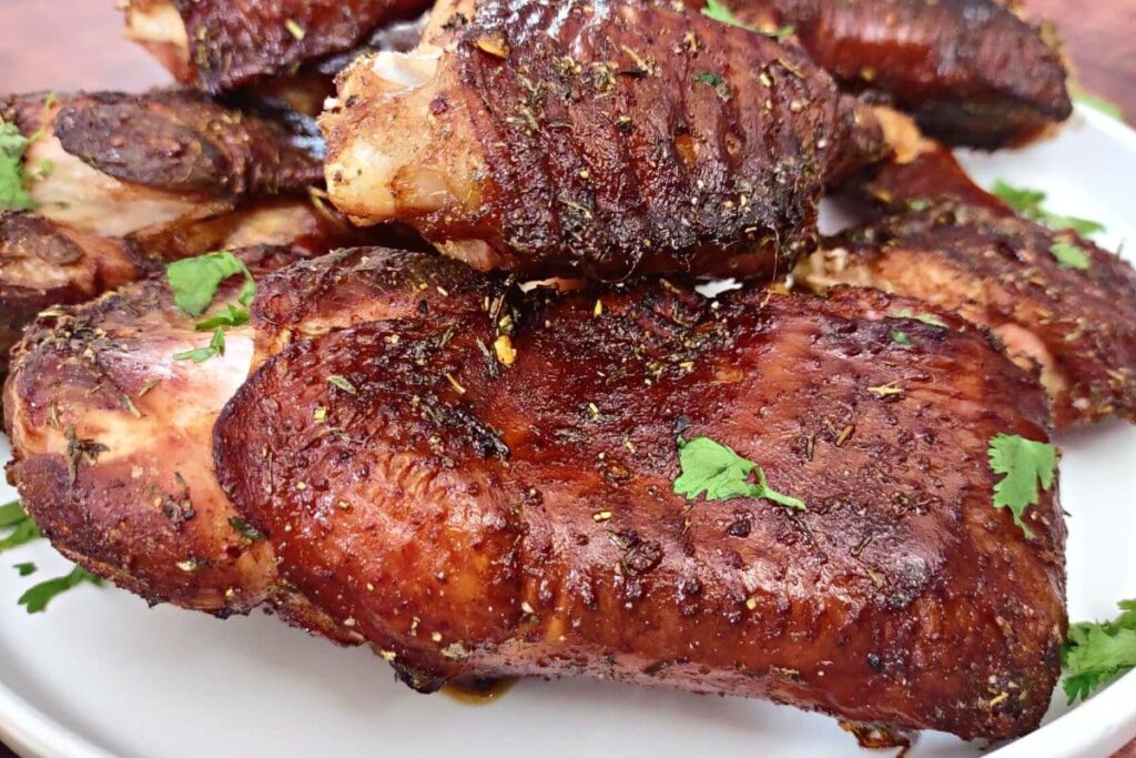 closeup of air fryer smoked turkey wings on a plate