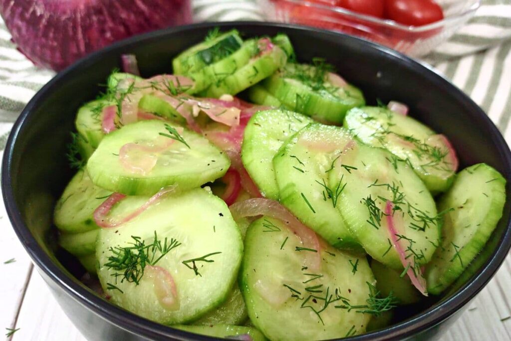 closeup of vinegar cucumber salad in a bowl