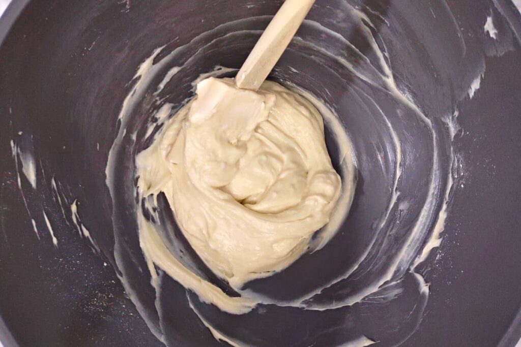 combine cream cheese, powdered sugar, and vanilla extract in a bowl