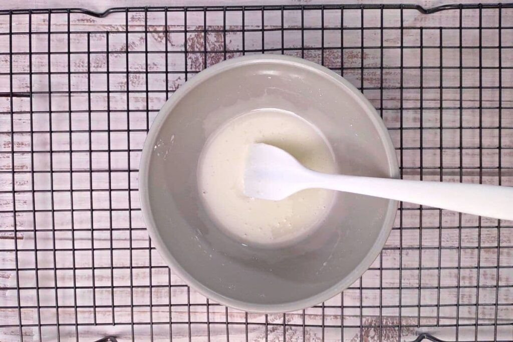 combine powdered sugar and lemon juice in a bowl to make a glaze