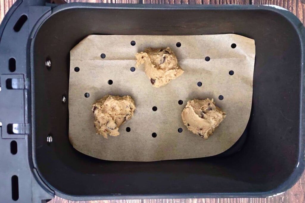 dollop cookie dough in air fryer basket