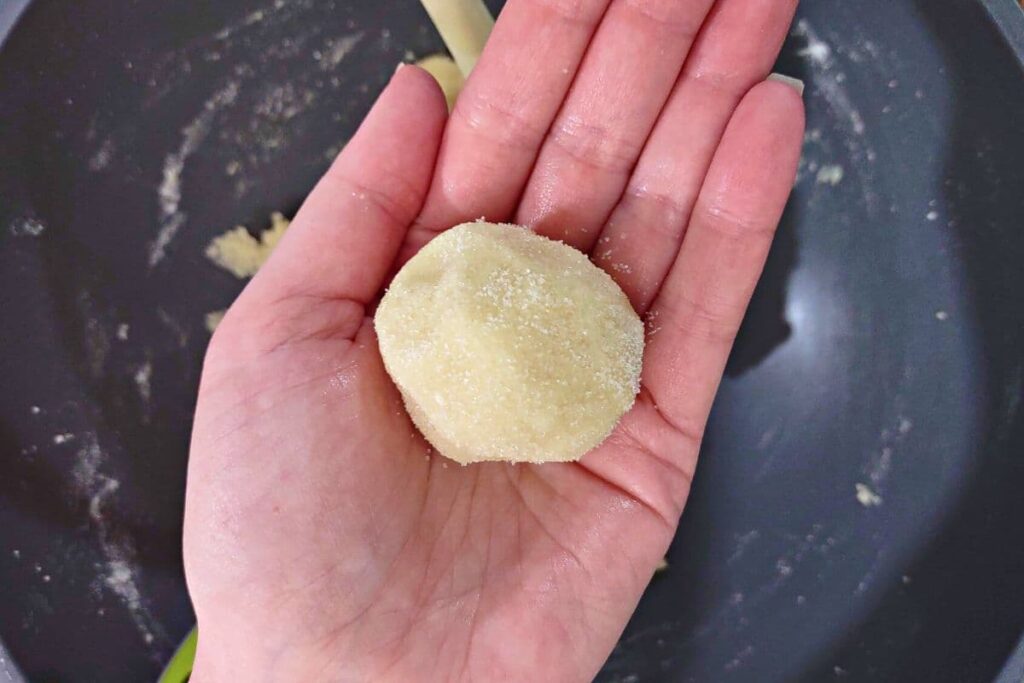 form cookie dough into a ball with your hand