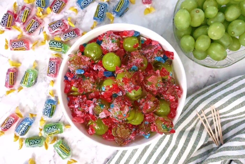 overhead view of jolly rancher grapes in a bowl