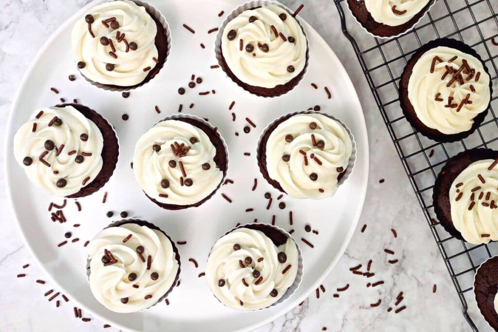 overhead view of several chocolate mocha cupcakes in a circle on a plate