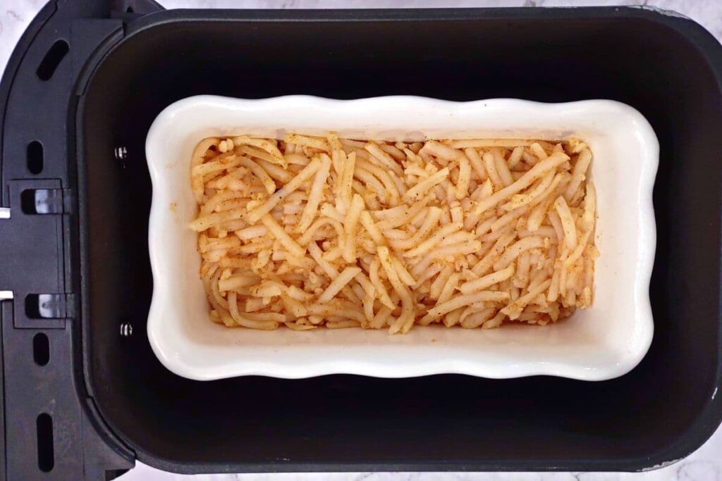 place hash browns in air fryer basket