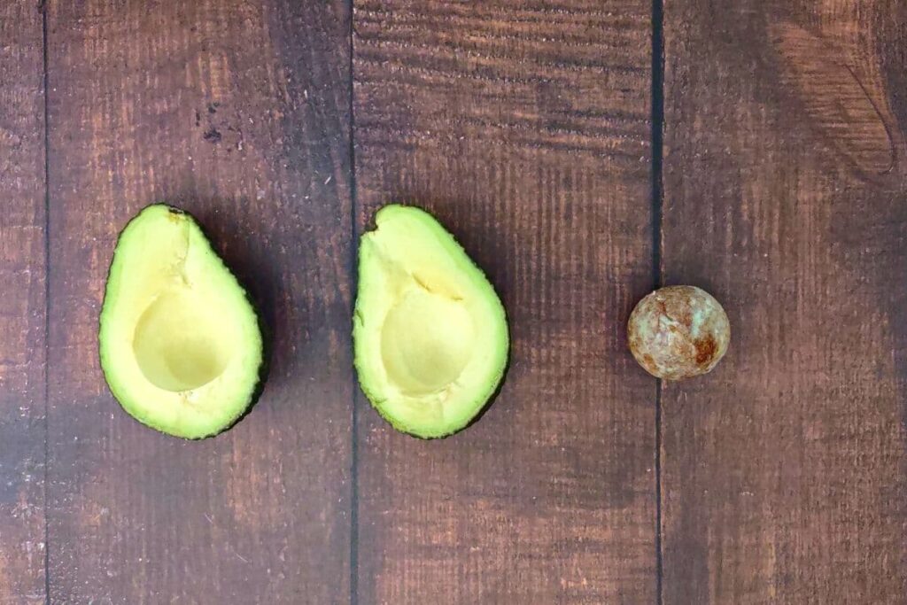 slice avocado in half and remove the pit