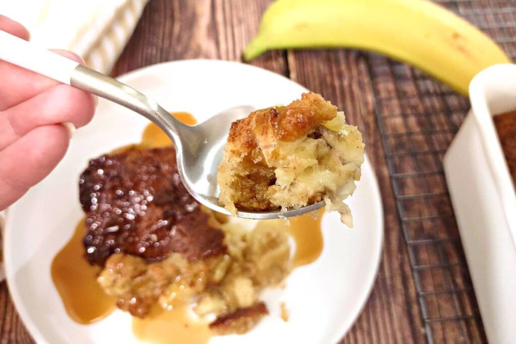 spoonful of banana bread pudding made in the air fryer