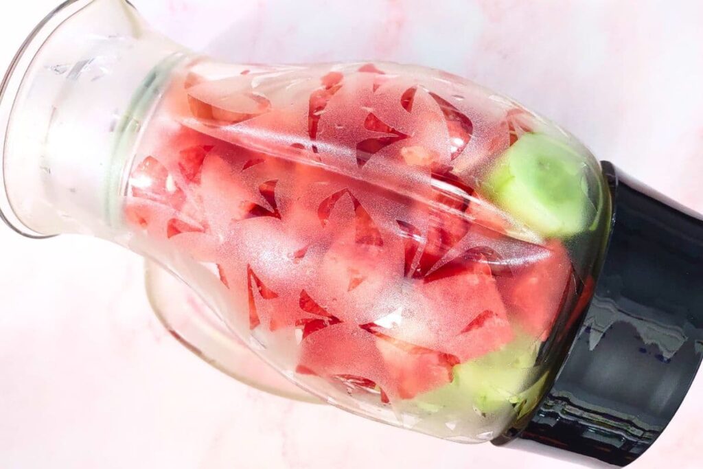 add watermelon, cucumber, and ingredients to blender