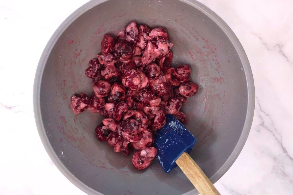 combine cherries, sugar, cornstarch, and almond extract in a bowl