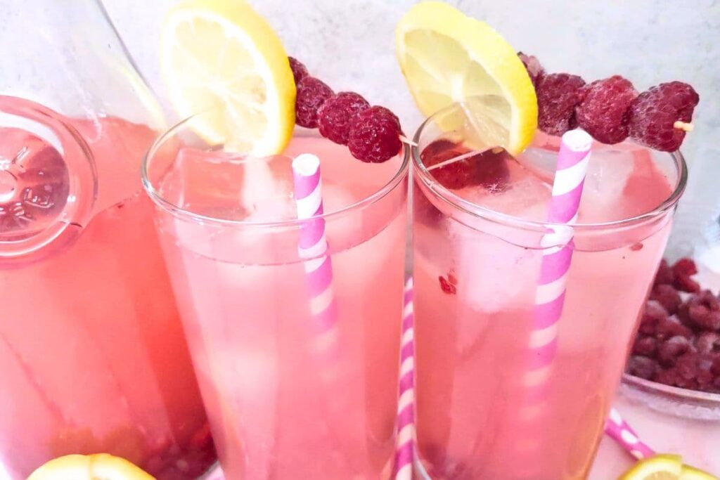 top your glasses of raspberry vodka lemonade with fresh fruit