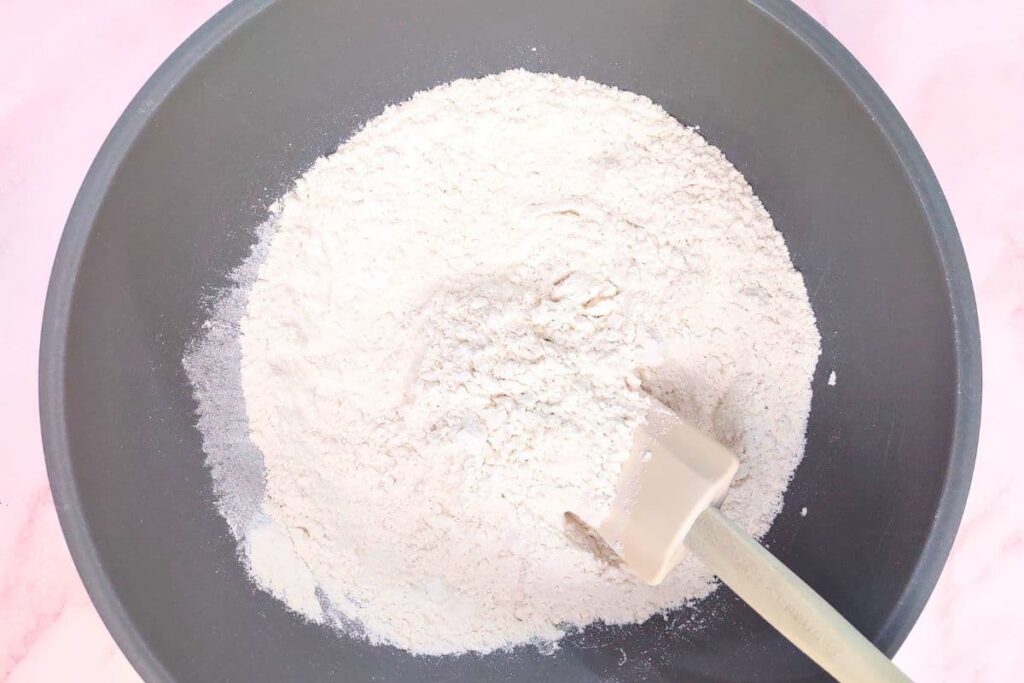 combine flour, baking powder, sugar, and salt