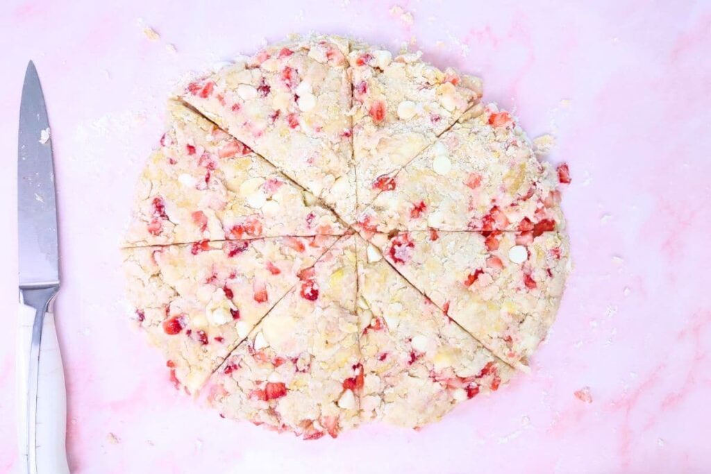 cut the strawberry white chocolate dough into even pieces