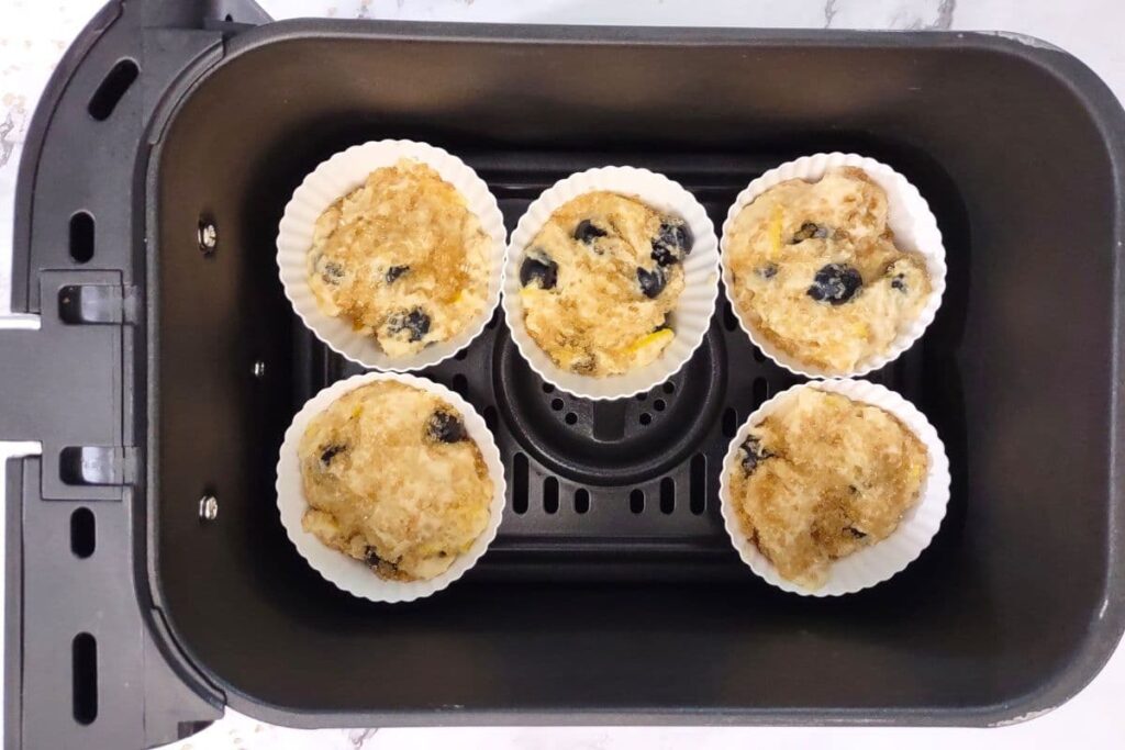 place blueberry muffins in air fryer basket