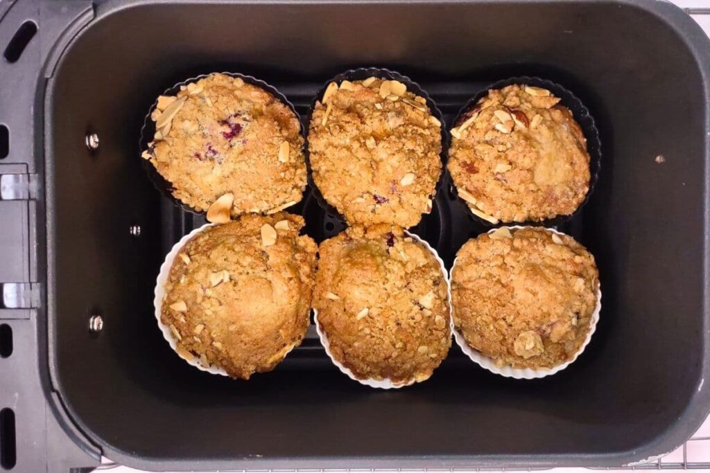 place raspberry muffins in air fryer basket