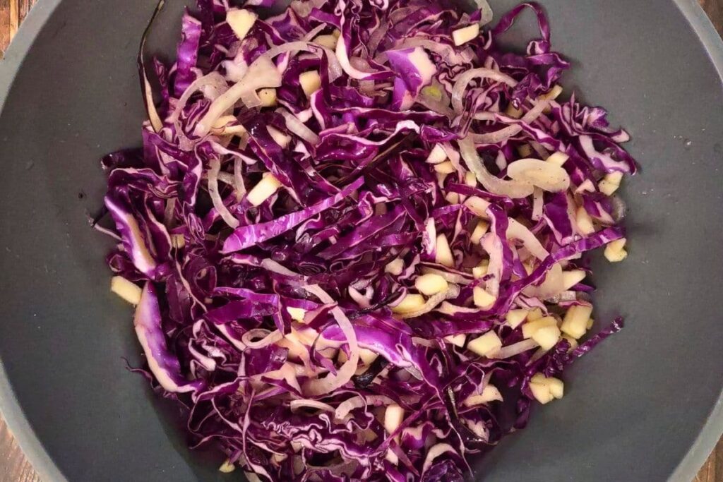 add remaining ingredients to the bowl with the red cabbage