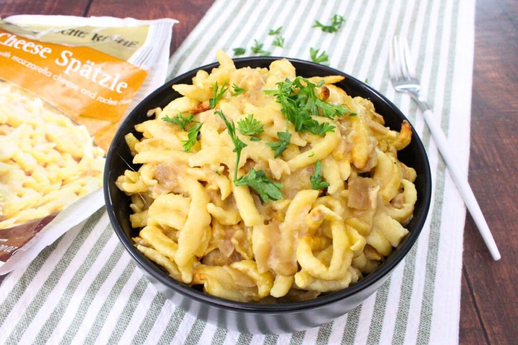 bowl of cheesy aldi spaetzle in a bowl made in the air fryer