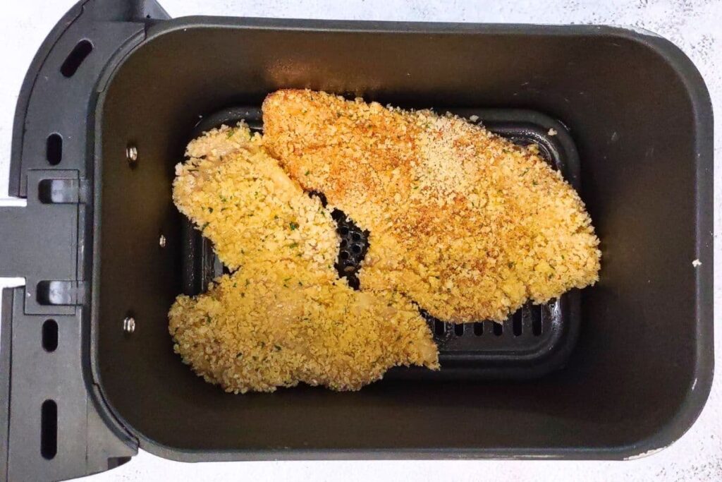 place breaded coated chicken in air fryer basket