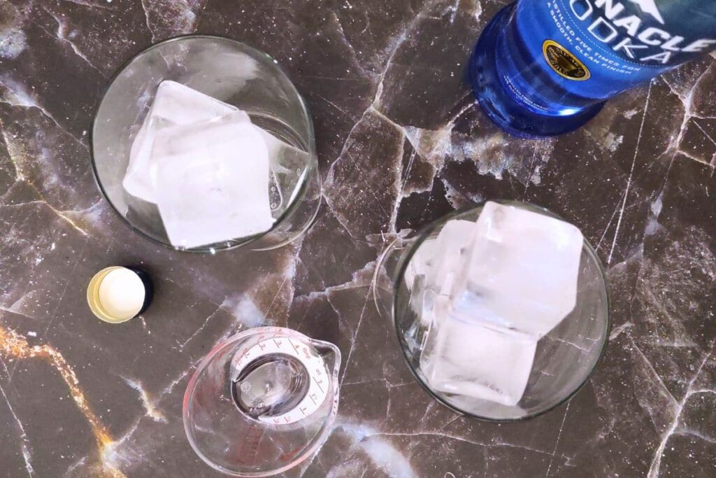 pour vodka over the ice in your cocktail glasses