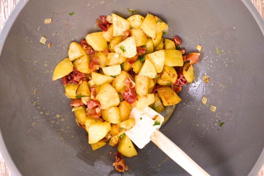 toss air fried potatoes and bacon in the dressing to coat